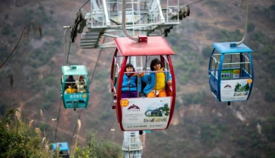 students from nizhuhe village take a cable car on their way to school in puli township xuanwei city southwest china s yunnan province xinhua jiang wenyao