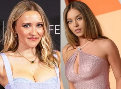 emily osment fans the flames by liking a post shading sydney sweeney s film