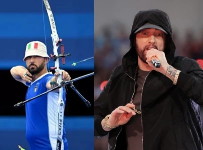 eminem fans speculate he s living a double life as doppelganger competes in 2024 paris olympics