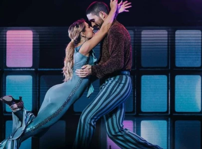 emma slater and alan bersten confirm relationship with an onstage kiss during dwts tour