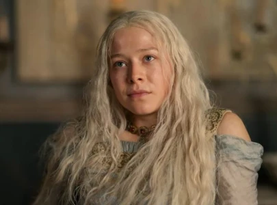 blinged out emma d arcy flaunts house of dragon themed grills at season two premiere