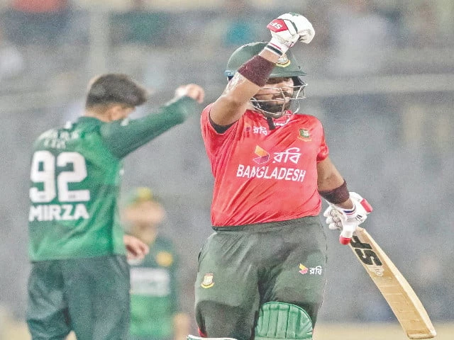 bangladesh s parvez hossain emon celebrates after scoring a half century during the first twenty20 international cricket match against pakistan at the sher e bangla national cricket stadium in dhaka on july 20 photo afp