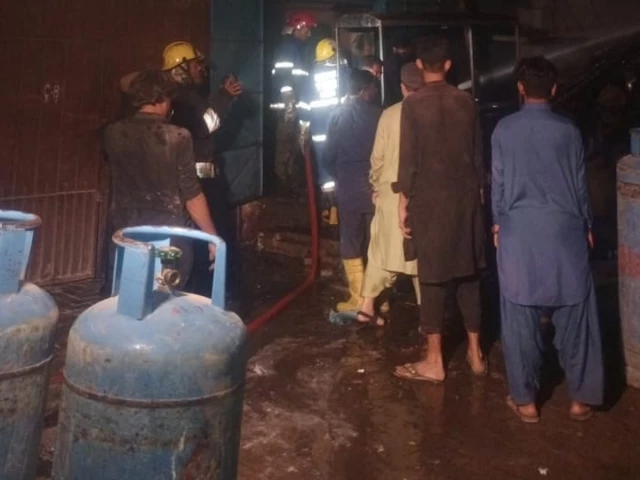 blast in lpg cylinder shop on karachi s abul hassan isphahani road left seven injured on november 1 photo express blast in lpg cylinder shop on karachi s abul hassan isphahani road left seven injured on november 1 photo express