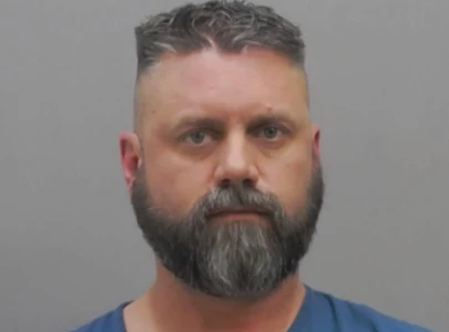 ohio police officer arrested for secretly filming teenage girl with hidden bathroom camera