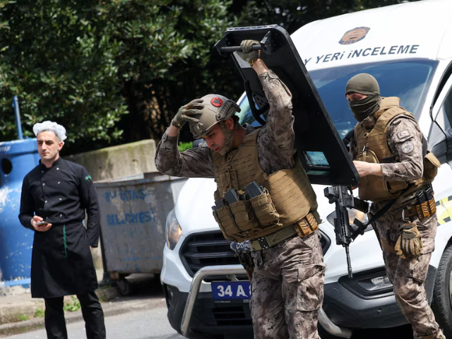 Turkish Police's special forces work at the scene, after gunfire was heard near the building housing the Israeli consulate, according to a witness, in Istanbul, Turkey. PHOTO: REUTERS