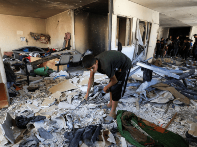 A Palestinian inspects the damage in the aftermath of an overnight Israeli strike on Al-Remal clinic where displaced people take shelter, in Gaza City on July 7, 2025. — Reuters