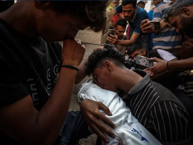 Bodies of Palestinians are brought to al-Shifa Hospital in Gaza City after an Israeli air raid [Ali Jadallah/Anadolu]