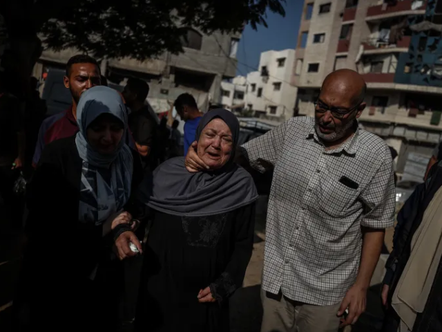 Bodies of Palestinians are brought to al-Shifa Hospital in Gaza City after an Israeli air raid [Ali Jadallah/Anadolu]