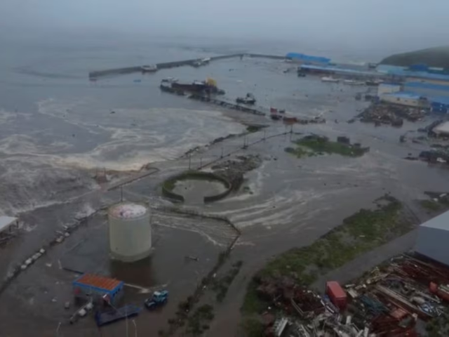 Tsunami waves flood an area after a powerful magnitude 8.8 earthquake struck off Russia's far eastern Kamchatka Peninsula, in Severo-Kurilsk, Sakhalin Region, Russia, July 30, 2025, in this still image taken from video. Kamchatka branch of the Geophysical Survey of the Russian Academy of Sciences/Handout-REUTERS