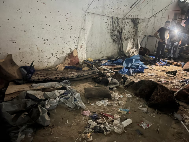 Palestinian children stands at the site of an Israeli strike on a tent near Shifa Hospital where Al Jazeera journalists Anas Al Sharif, Mohammed Qreiqeh, Ibrahim Zaher, and Mohammed Noufal were killed, in Gaza City August 11, 2025. REUTERS