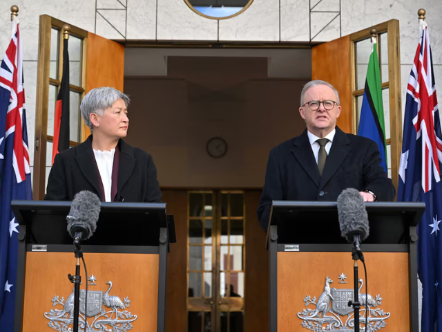 Australian Prime Minister Anthony Albanese speaks next to Minister for Foreign Affairs Penny Wong during a press conference at Parliament House in Canberra, Australia, August 11, 2025. Prime Minister Albanese says Australia will recognise a Palestinian state at UN general assembly. AAP/via REUTERS