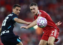 liverpool spend big to hold off arsenal