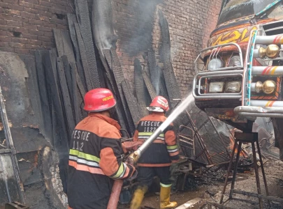lahore workshop blaze under control cooling operations underway