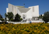 police officers walk past the supreme court of pakistan building in islamabad pakistan april 6 2022 reuters