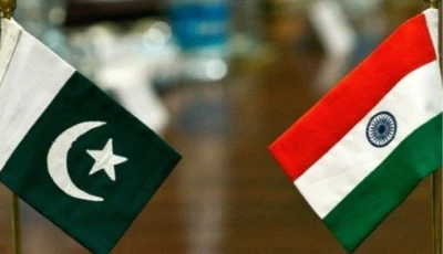 indian flag on the left and pakistani flag on the right photo file