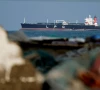 an lpg gas tanker at anchor as traffic is down in the strait of hormuz amid the u s  israeli conflict with iran in shinas oman march 11 2026 reuters