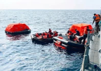 sri lanka navy personnel assist iranian sailors during a rescue operation after responding to a distress call from their vessel the iranian military ship iris dena while at sea within sri lanka s maritime search and rescue region in indian ocean sri lanka march 4 2026 sri lanka navy handout via reuters