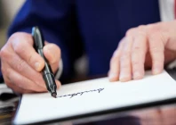 us president donald trump writes his signature as he signs executive orders and proclamations in the oval office at the white house in washington dc us april 9 2025 reuters us president donald trump writes his signature as he signs executive orders and proclamations in the oval office at the white house in washington dc us april 9 2025 reuters