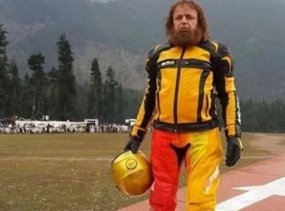 pakistani stuntman sultan golden sets reverse drive world record pakistani stuntman sultan golden sets reverse drive world record