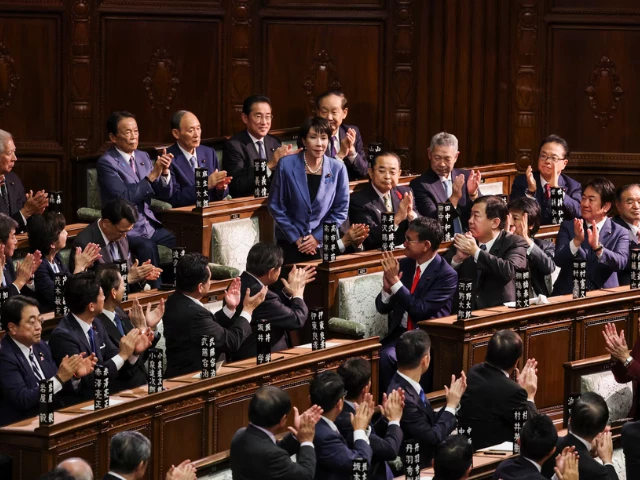leader of japan s ruling liberal democratic party ldp sanae takaichi reacts as she receives applause after being elected as prime minister at the lower house of parliament in tokyo japan october 21 2025 reuters