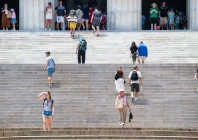 a person descending the stairs of the lincoln memorial covers her face with her hand amid a heatwave in washington dc us photo reuters