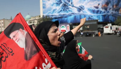 an iranian woman shouts during a march in tehran iran photo reuters