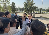 pti chairman barrister gohar khan is speaking to the media outside the parliament house photo x