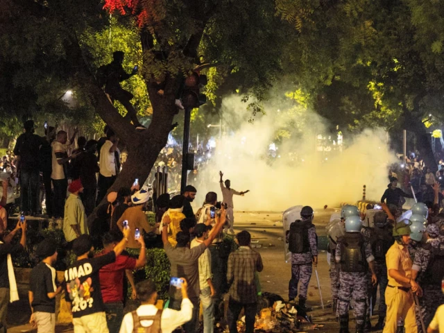 police use teargas to control the crowd during the ongoing protest of cockroach janata party cjp two days after thousands of protesters marched towards parliament demanding the resignation of education minister dharmendra pradhan over examination paper leaks at jantar mantar in new delhi india photo reuters police use teargas to control the crowd during the ongoing protest of cockroach janata party cjp two days after thousands of protesters marched towards parliament demanding the resignation of education minister dharmendra pradhan over examination paper leaks at jantar mantar in new delhi india photo reuters