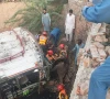 passenger bus overturned and plunged into a drainage channel near fatehke in pindi bhattian photo express