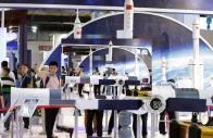people visit the booth of china aerospace science and technology corporation at china beijing international high tech expo in beijing photo reuters