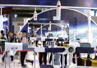 people visit the booth of china aerospace science and technology corporation at china beijing international high tech expo in beijing photo reuters