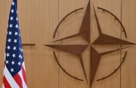 this photo shows the logo of the north atlantic treaty organisation nato and the us flag prior to a meeting by the us special envoy for ukraine and the nato secretary general to address the ongoing war in ukraine at nato headquarters in brussels belgium photo reuters