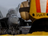 an f a 18f super hornet prepares to launch from the flight deck of the u s navy nimitz class aircraft carrier uss abraham lincoln at an undisclosed location during the operation epic fury attack on iran photo reuters