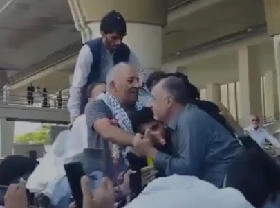 heroic return mushtaq ahmad lands at islamabad airport