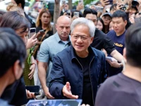 nvidia ceo jensen huang greets fans during his visit to a pc cafe in seoul south korea photo reuters