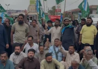 ji began a protest at natha khan bridge on shahrah e faisal in karachi photo express