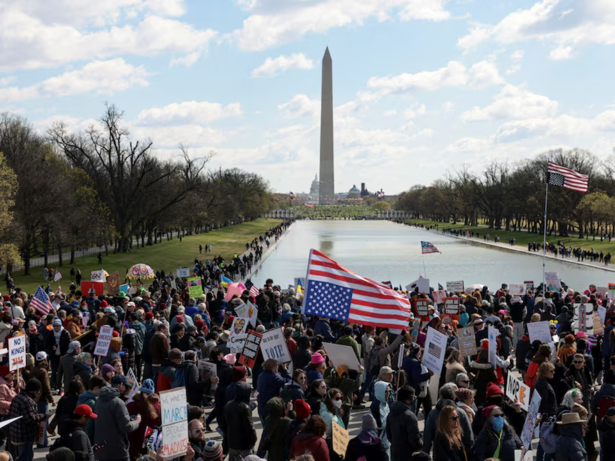 Demonstrators participate in a