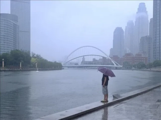 Beijing shuts tourist sites, suspends bus services as heavy rain continues