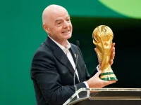 fifa president gianni infantino holds the world cup trophy photo reuters