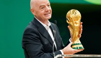 fifa president gianni infantino holds the world cup trophy photo reuters