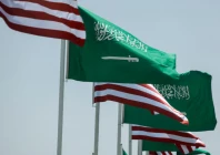 us and saudi flags flutter along a highway of riyadh as pictured through the glass of a car ahead of the arrival of us president donald trump to riyadh saudi arabia photo reuters