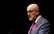 australia charges two chinese nationals with foreign interference