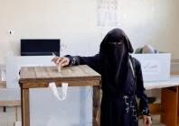 a palestinian woman votes during the municipal election at a polling station in deir al balah central gaza photo reuters