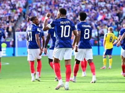 mbappe s brace lifts france into round of 16 of world cup