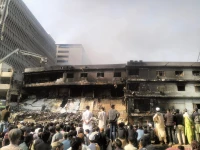 affected shopkeepers are left stunned after witnessing scenes of destruction at gul plaza photo express