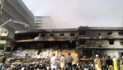 affected shopkeepers are left stunned after witnessing scenes of destruction at gul plaza photo express