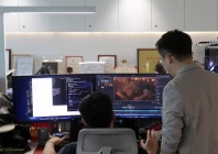 zhu zhili a chinese ai director discusses an ai generated video with a colleague at the office of china wit media a film and television production company in shenzhen guangdong province china photo reuters