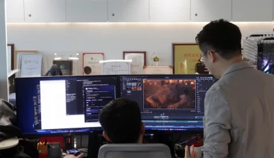 zhu zhili a chinese ai director discusses an ai generated video with a colleague at the office of china wit media a film and television production company in shenzhen guangdong province china photo reuters