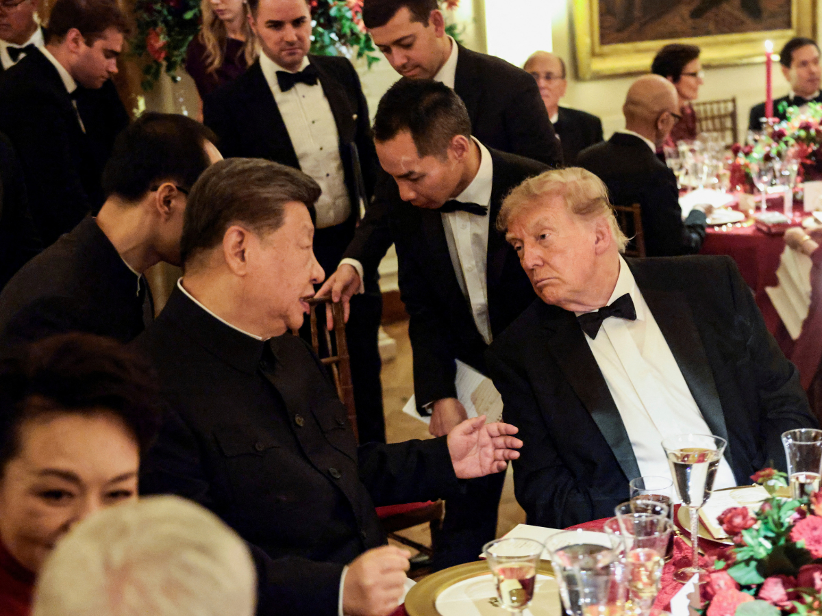 Chinese President Xi Jinping and US President Donald Trump speak during a state dinner at the White House in Washington, DC, US. Photo: Reuters