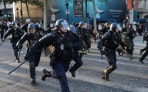 dozens arrested in paris clashes on psg victory night police